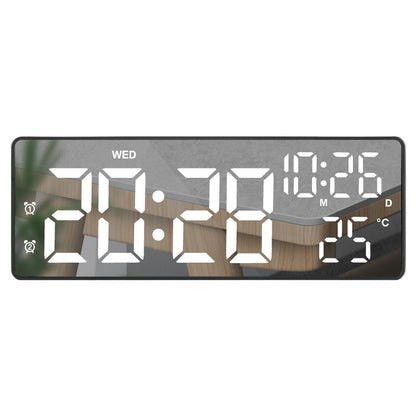 Battery-powered plug-in alarm clock