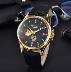 Gold case black dial