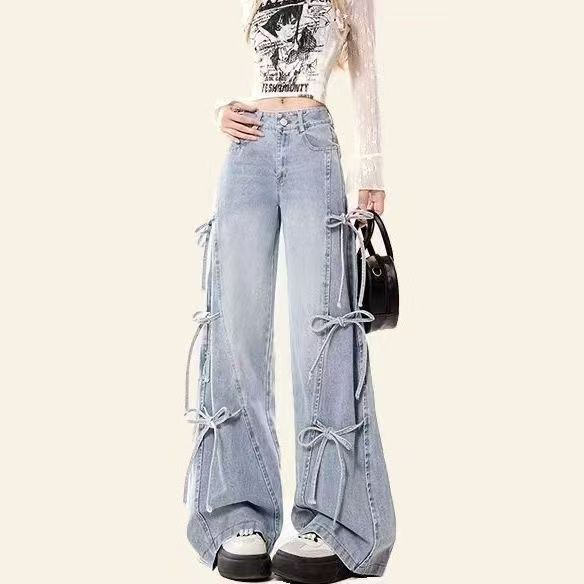 Belted jeans with bow ties