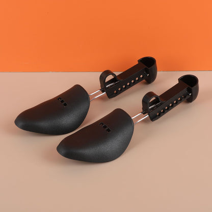 Black adjustable plastic shoe supports