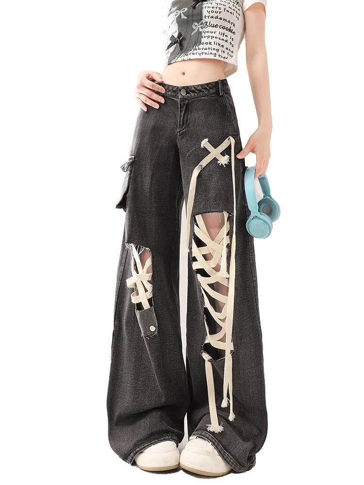 Black ankle-belted ripped jeans