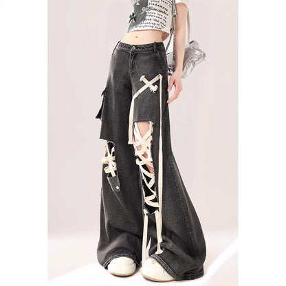 Black ankle-belted ripped jeans