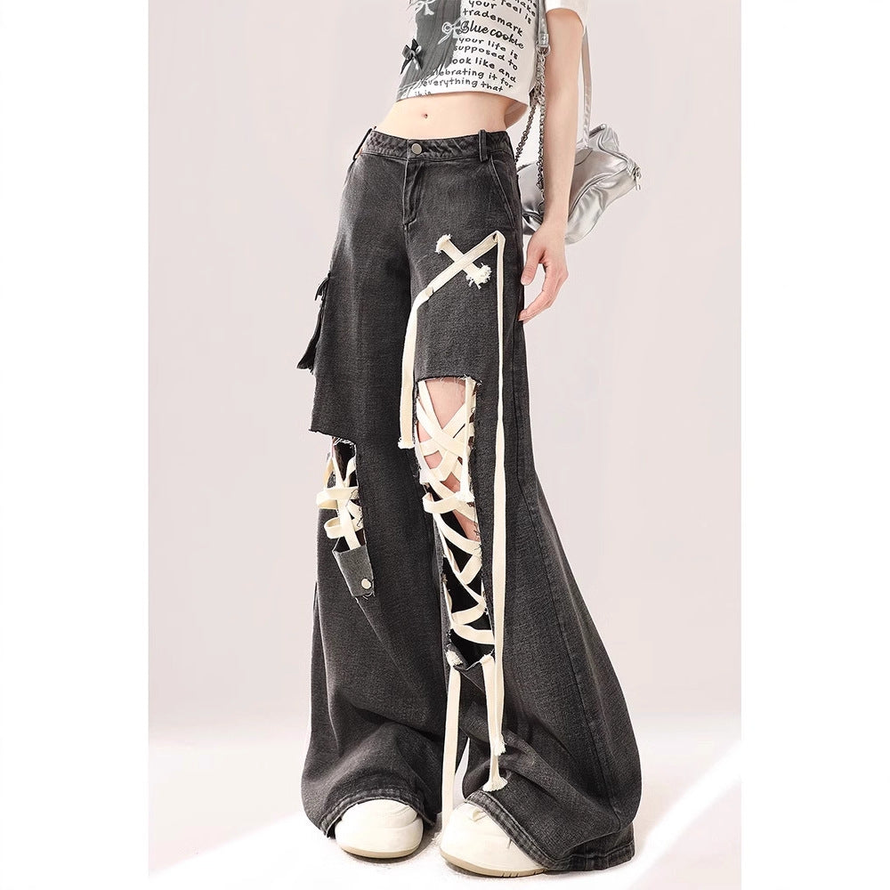 Black ankle-belted ripped jeans
