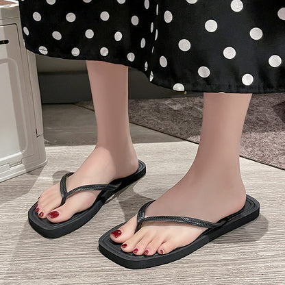 Black flip flops