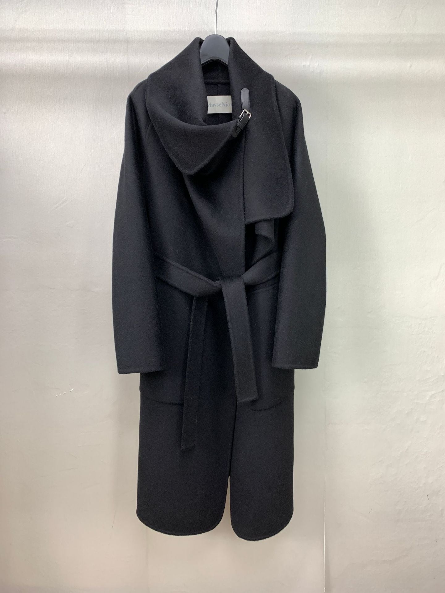 Black leather buttoned cape-style coat