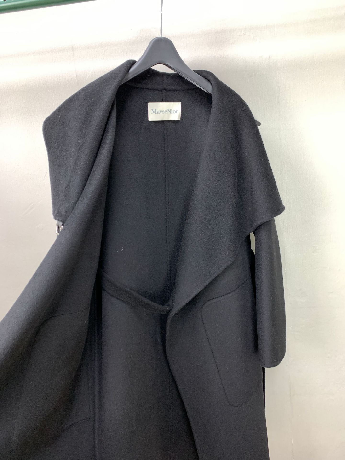Black leather buttoned cape-style coat