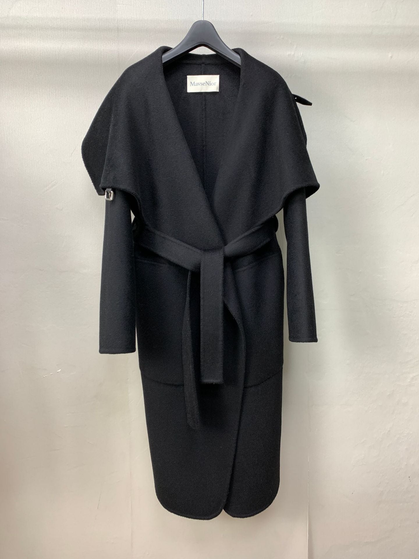 Black leather buttoned cape-style coat