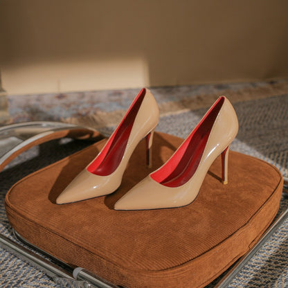 Black shoes with a red base and high heels