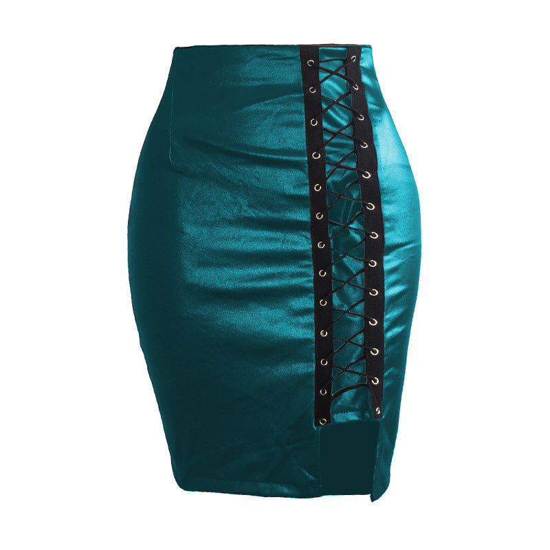 Black strapped, figure-hugging, slit leather skirt