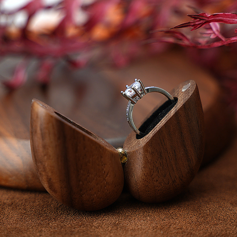 Black walnut wood ring box in the shape of a heart