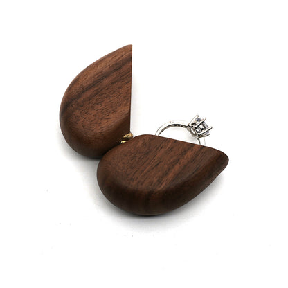 Black walnut wood ring box in the shape of a heart