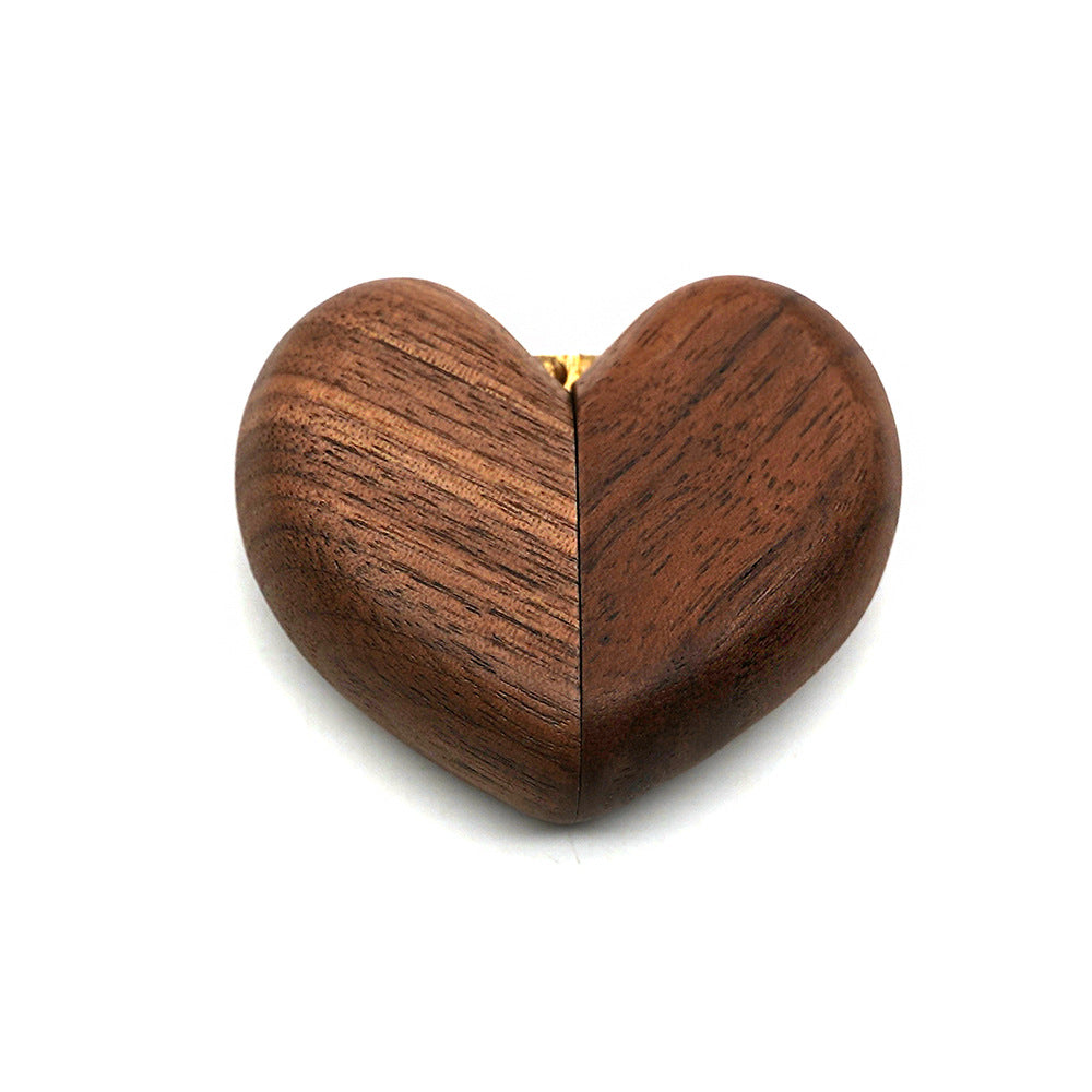 Black walnut wood ring box in the shape of a heart