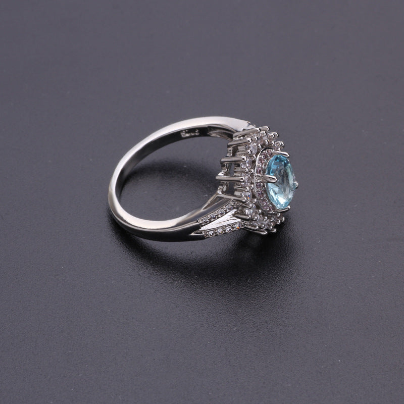 Blue diamond-studded ring