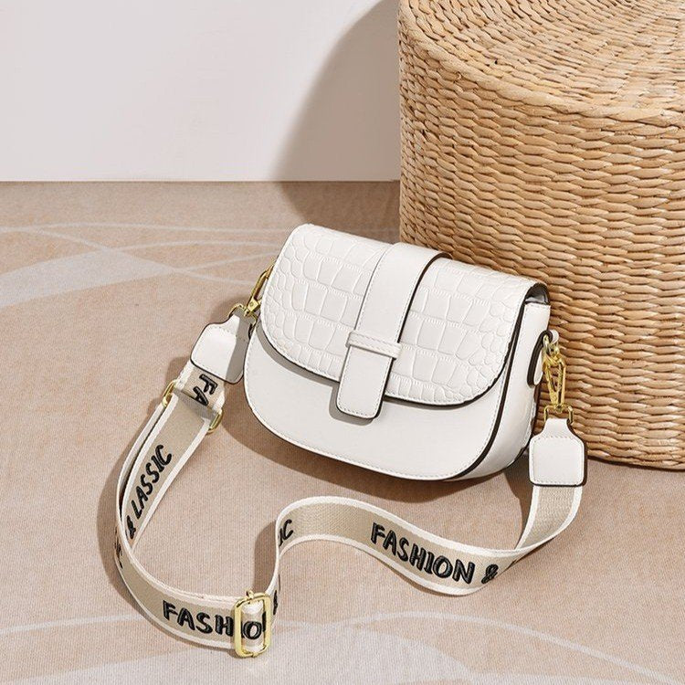 Broadband cross-body saddle bag