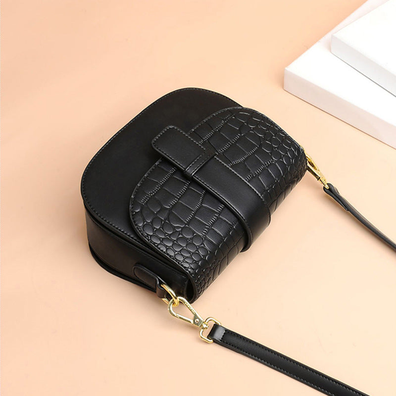 Broadband cross-body saddle bag
