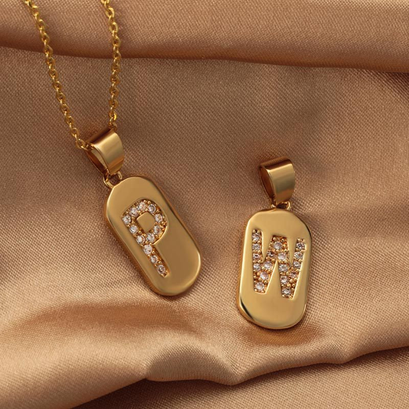 Bronze Letter Zircon Pendant