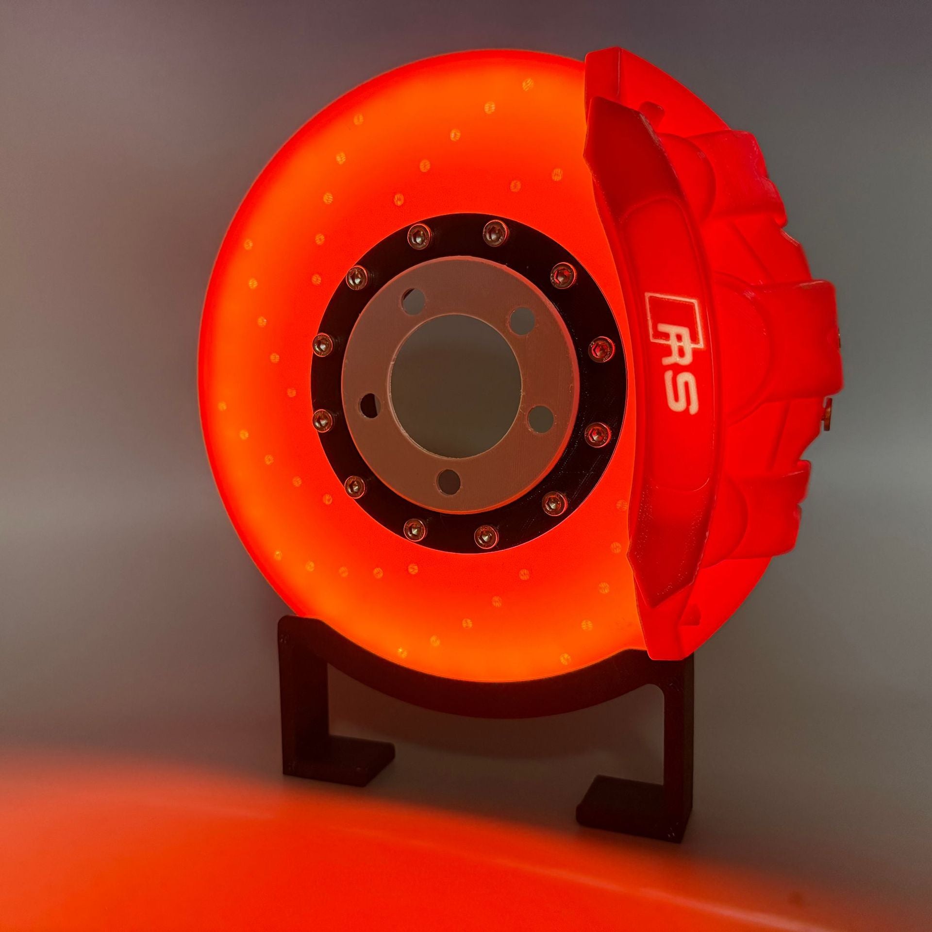 Caliper illuminated brake disc tabletop ambient light