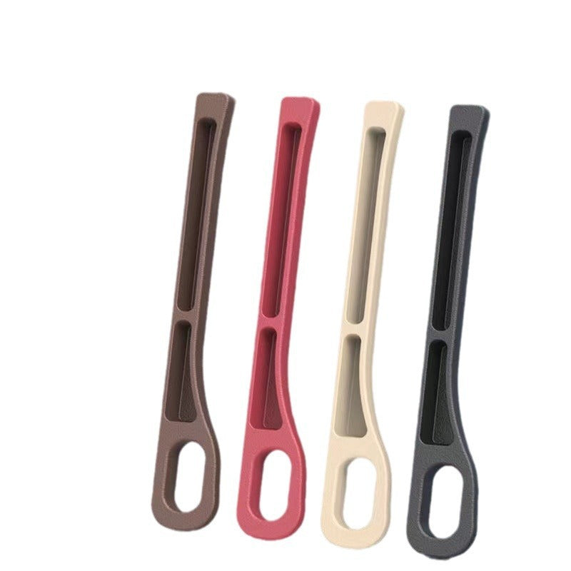 Car seat gap filler strip