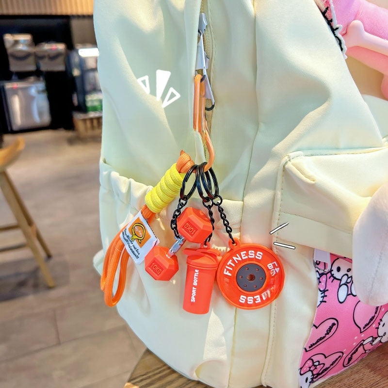 Cartoon Barbell Keychain for Sports Enthusiasts