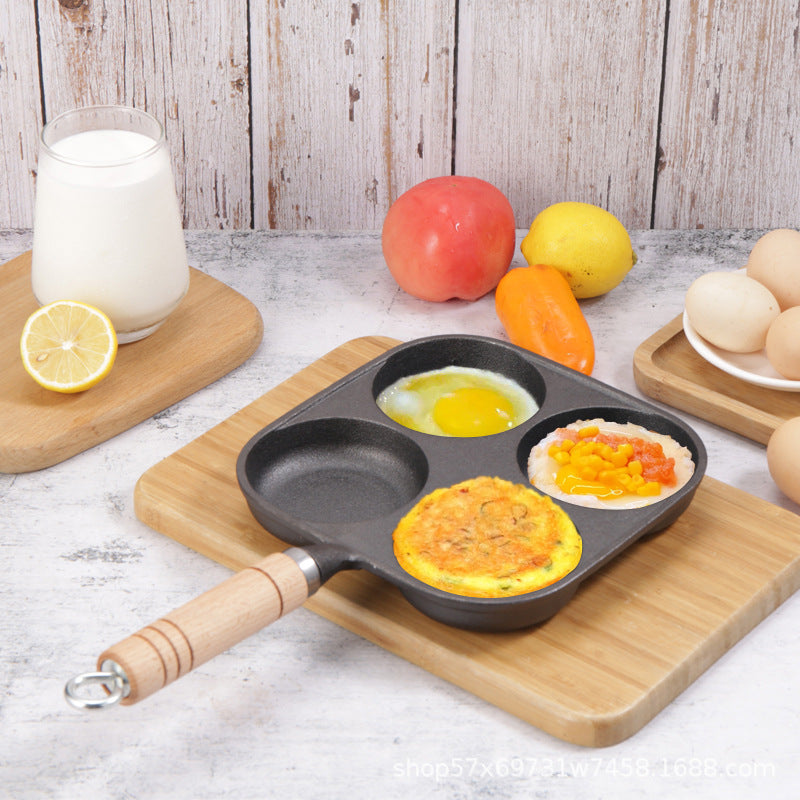Cast iron four-hole frying pan