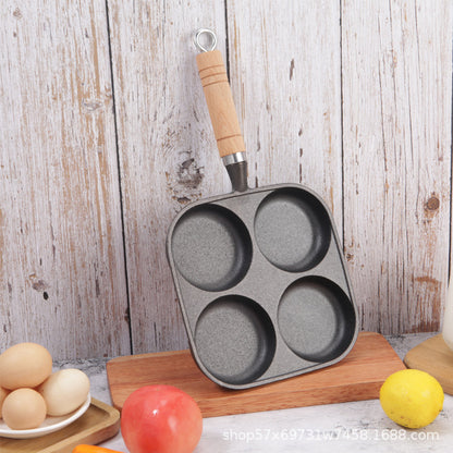 Cast iron four-hole frying pan