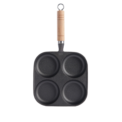 Cast iron four-hole frying pan