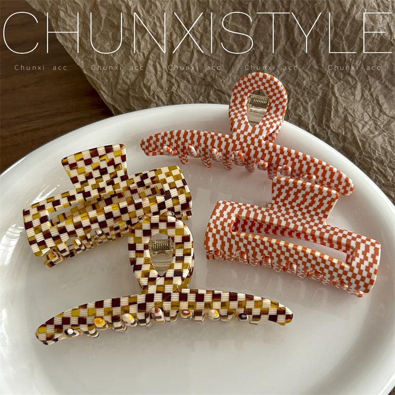 checkerboard patterned hair claw clip