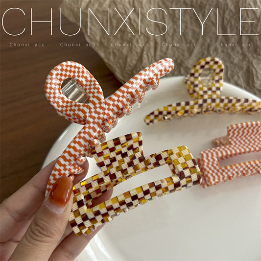 checkerboard patterned hair claw clip