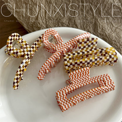 checkerboard patterned hair claw clip