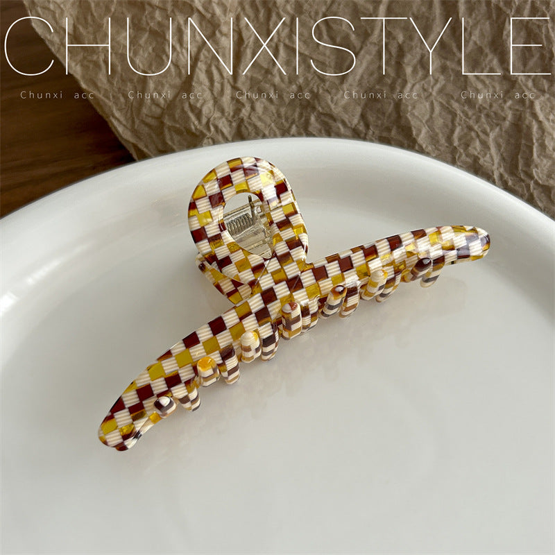 checkerboard patterned hair claw clip