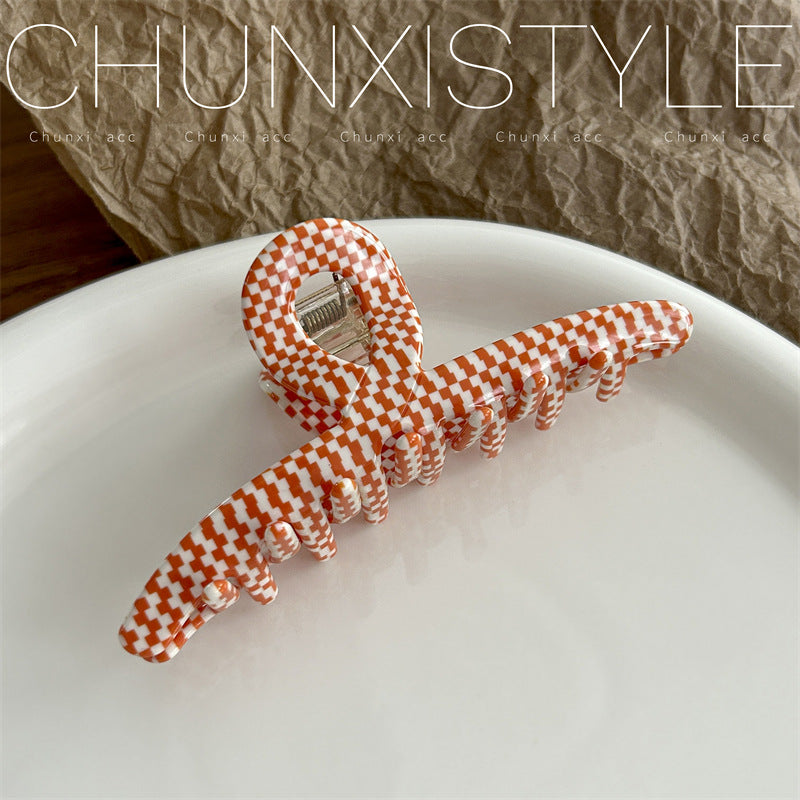 checkerboard patterned hair claw clip