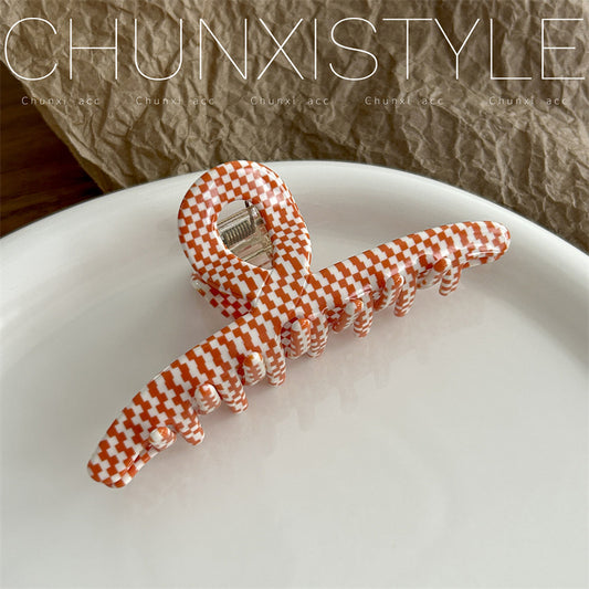 checkerboard patterned hair claw clip