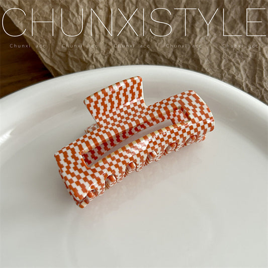 checkerboard patterned hair claw clip