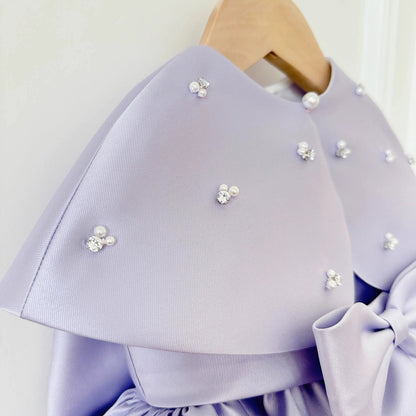 Children's formal dress in purple