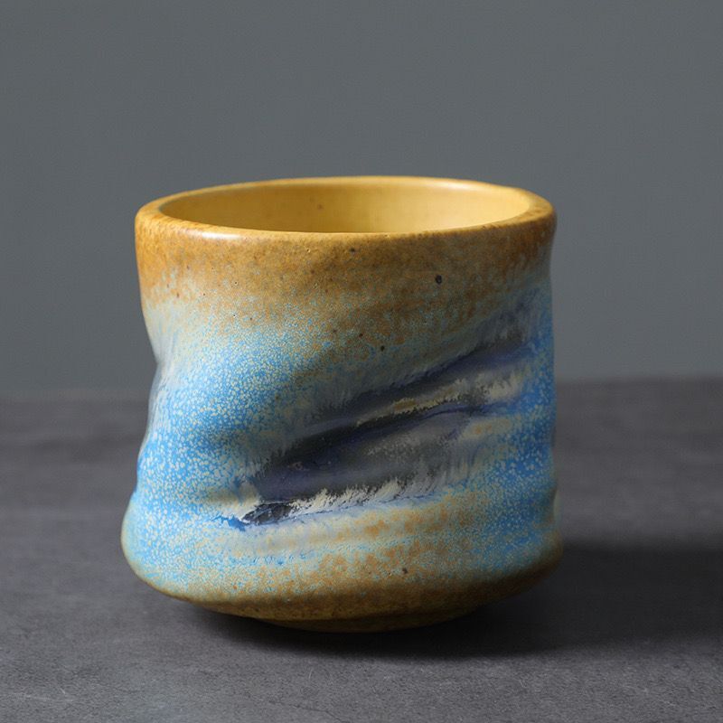 Coarse earthenware pleated tea cup
