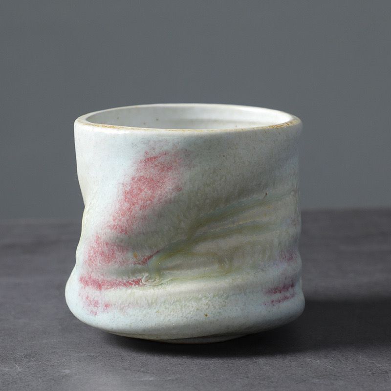 Coarse earthenware pleated tea cup