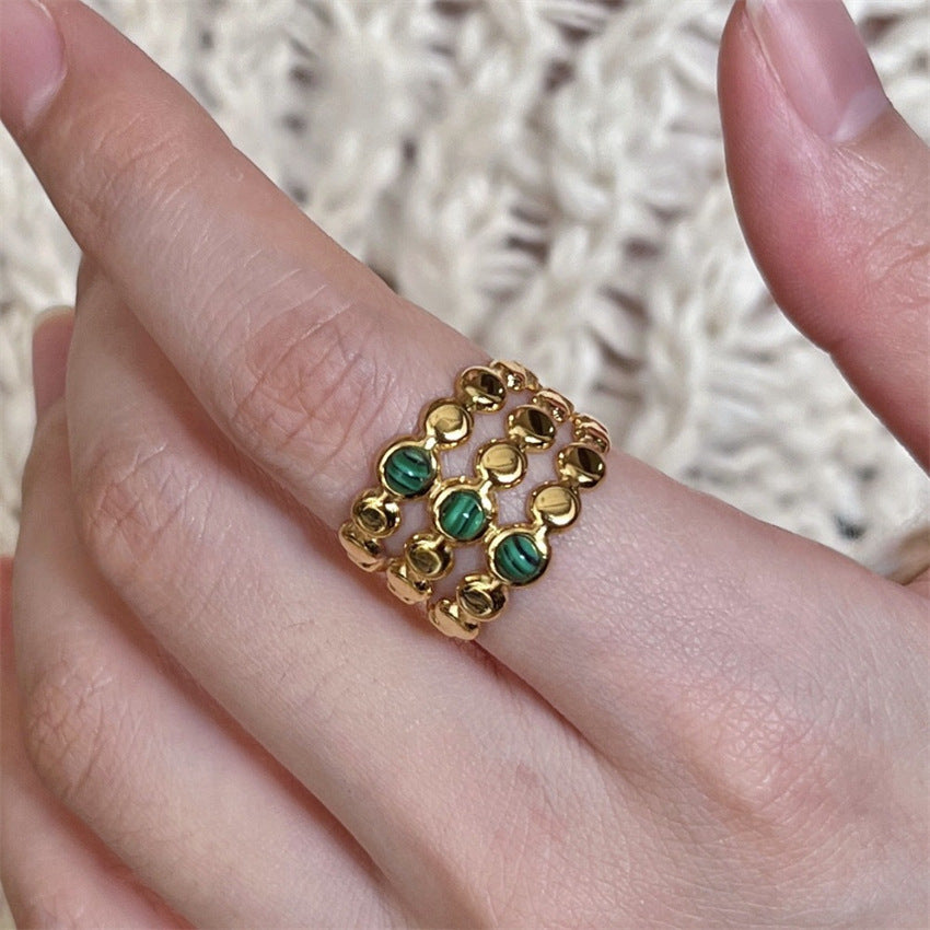 Colorful, layered, niche ring imitating natural stone