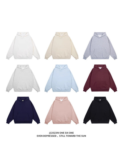 Complimentary solid-color hooded sweatshirt