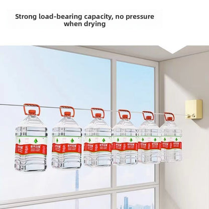 Concealed retractable clothesline for balconies