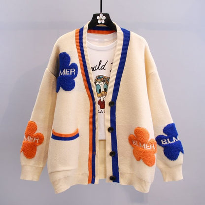 Contrasting-color small flower sweater coat