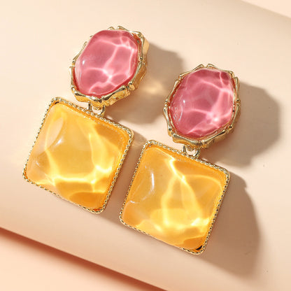 Contrasting color wave-pattern square earrings