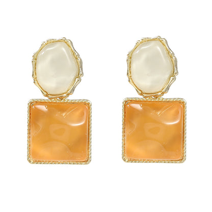 Contrasting color wave-pattern square earrings