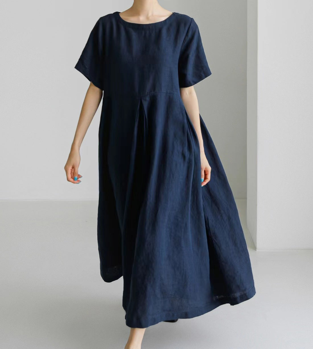 Cotton and linen style round-neck pullover, solid color over-the-knee long dress with a large hem