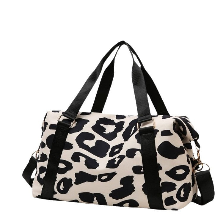Cow-pattern travel bag