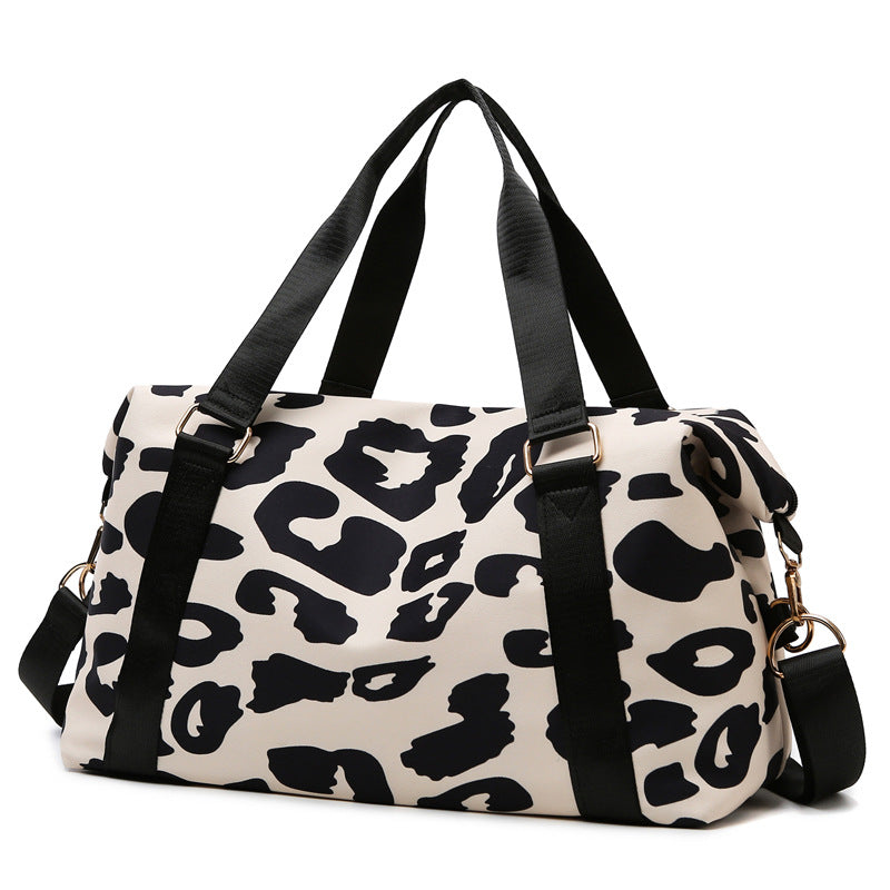Cow-pattern travel bag