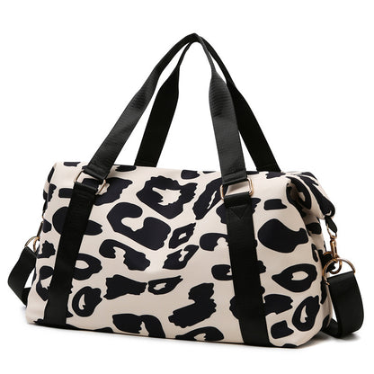 Cow-pattern travel bag