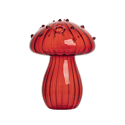 Creative glass ornaments, green plants, and flower vases