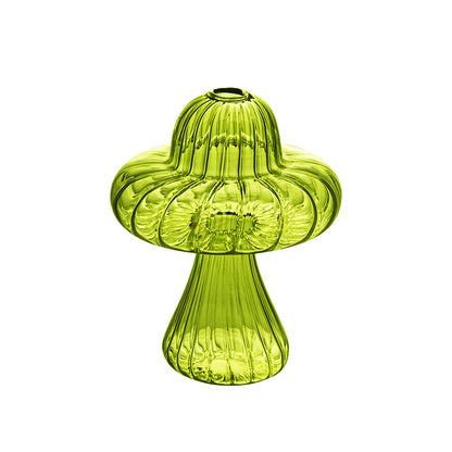 Creative glass ornaments, green plants, and flower vases