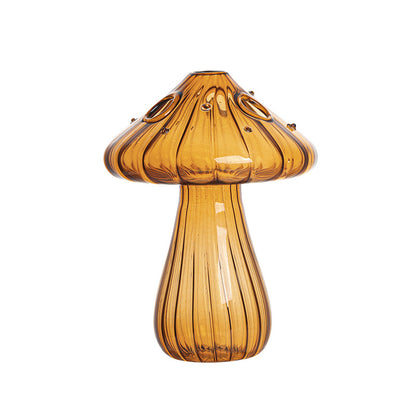 Creative glass ornaments, green plants, and flower vases