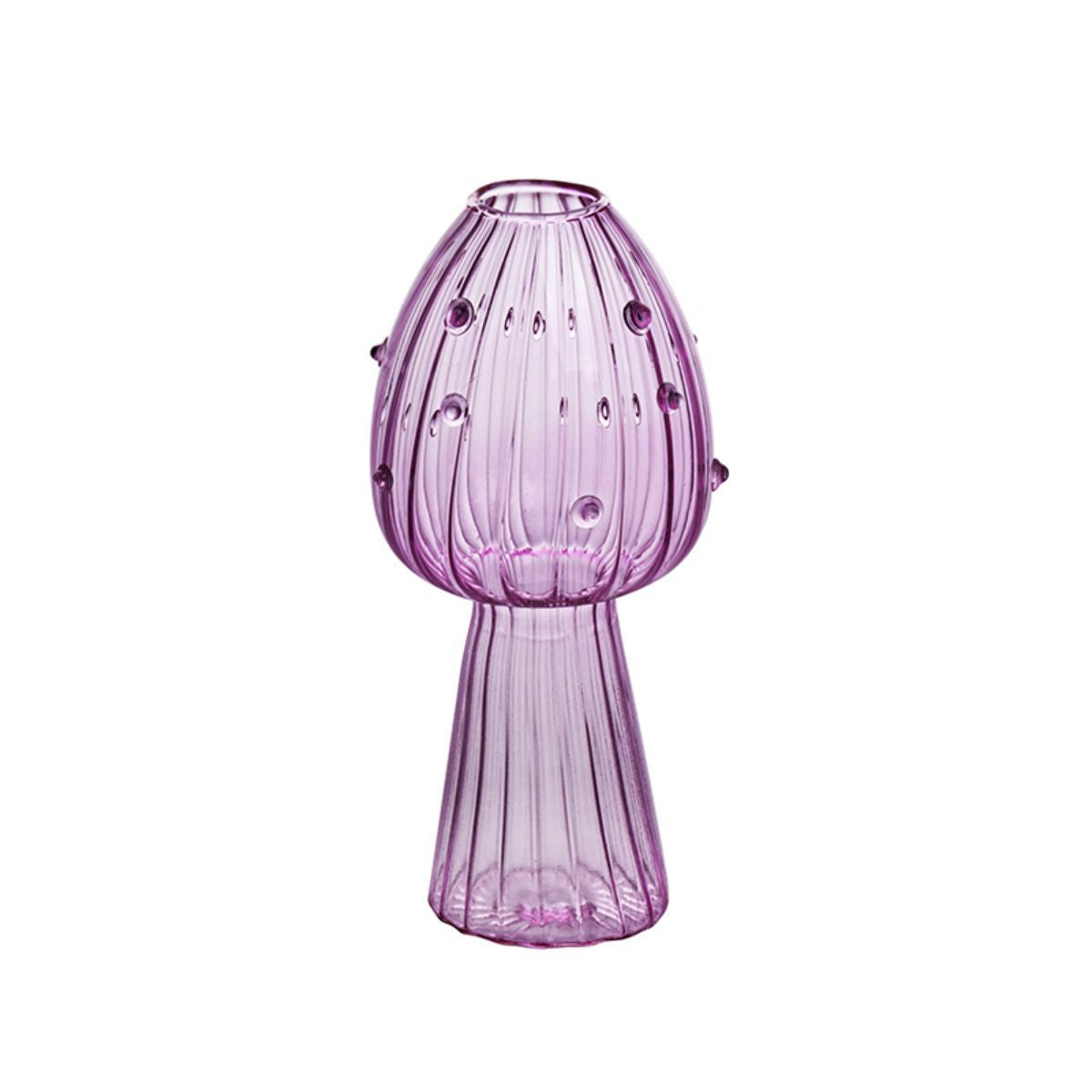Creative glass ornaments, green plants, and flower vases